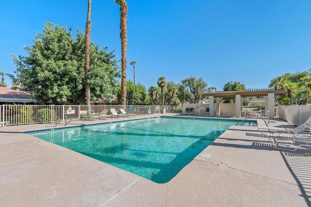 view of swimming pool featuring a patio area