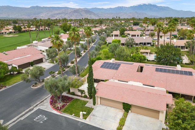 birds eye view of property featuring a mountain view