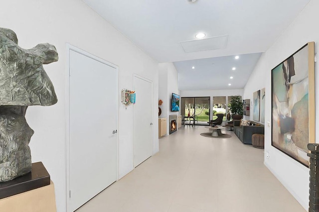 corridor with vaulted ceiling