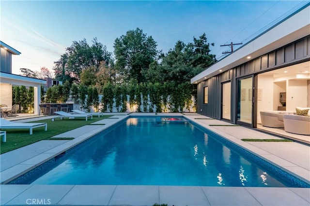 view of pool featuring a patio area