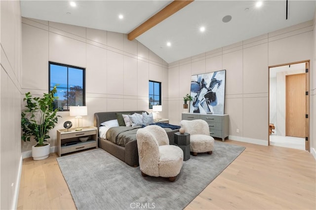 bedroom with high vaulted ceiling, light hardwood / wood-style flooring, and beam ceiling