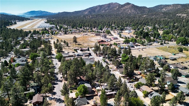 drone / aerial view featuring a mountain view