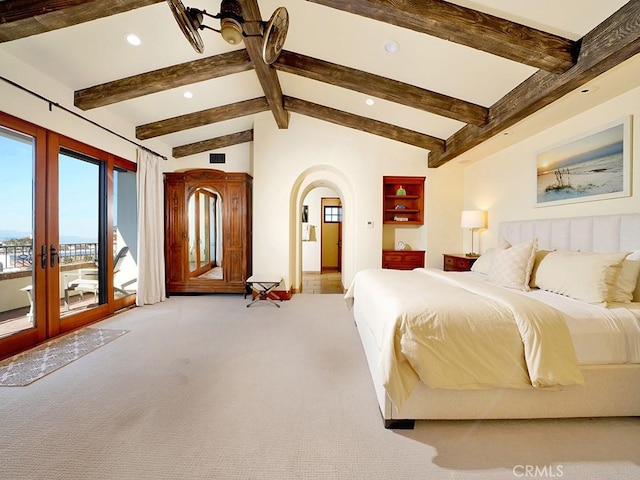 bedroom featuring access to outside, light colored carpet, lofted ceiling with beams, and french doors