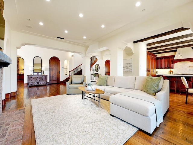 living room with dark hardwood / wood-style floors