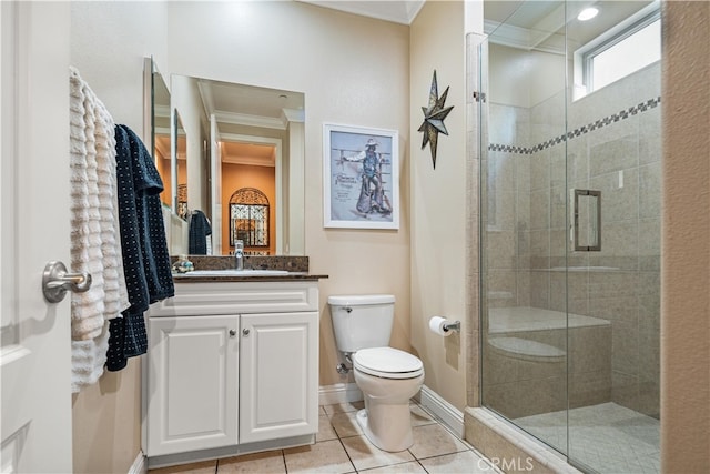 bathroom featuring crown molding, vanity, toilet, and an enclosed shower