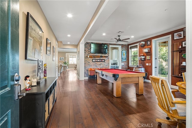 game room with pool table, crown molding, dark hardwood / wood-style floors, and ceiling fan