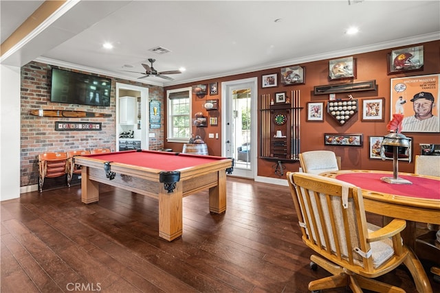 game room with pool table, crown molding, dark hardwood / wood-style flooring, and ceiling fan