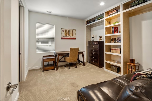 home office with light colored carpet