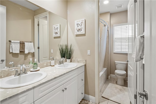 full bathroom featuring vanity, shower / tub combo, toilet, and tile patterned floors