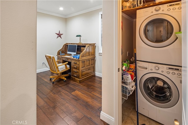 washroom featuring ornamental molding, dark wood-type flooring, and stacked washer and clothes dryer