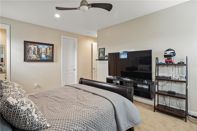 carpeted bedroom with ceiling fan