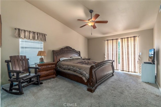 bedroom with ceiling fan, carpet, and lofted ceiling