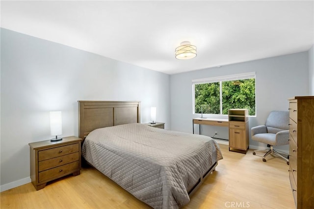 bedroom featuring light hardwood / wood-style floors