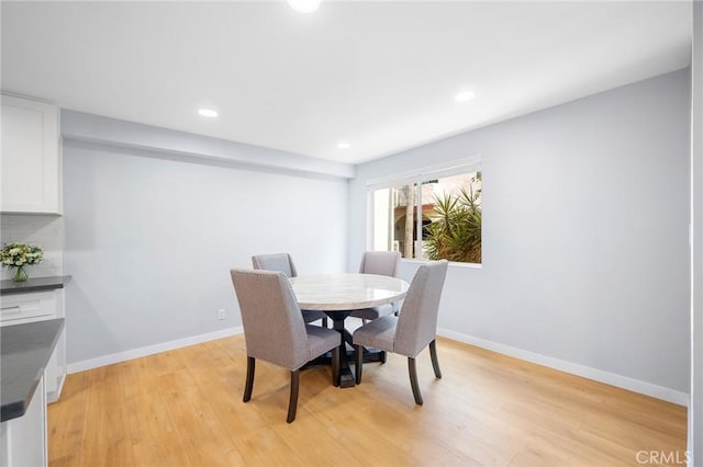 dining room featuring light hardwood / wood-style floors