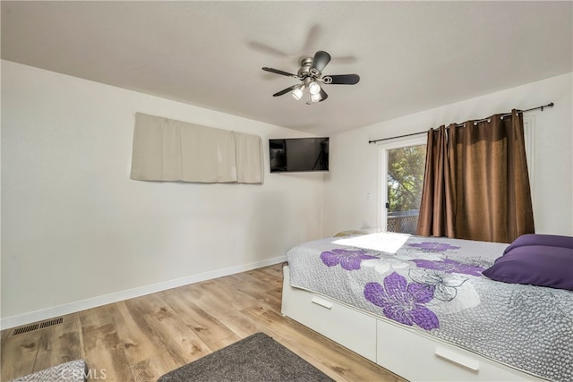 bedroom with light wood-type flooring and ceiling fan