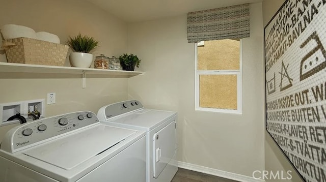 clothes washing area featuring washing machine and dryer