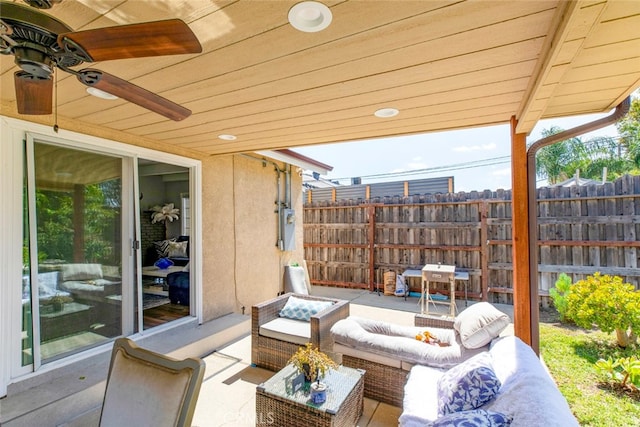 view of patio / terrace with ceiling fan and an outdoor hangout area