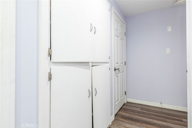 interior space with dark wood-type flooring