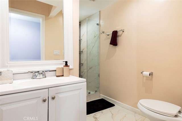 bathroom featuring an enclosed shower, vanity, and toilet