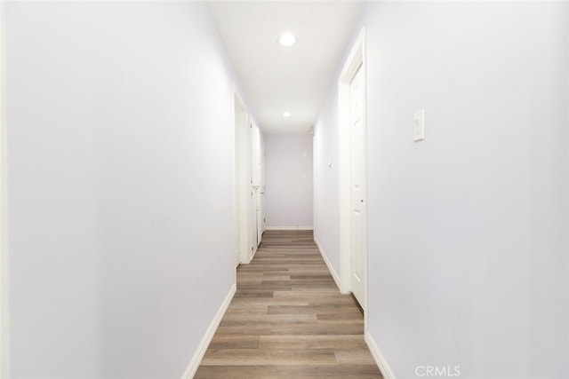 corridor featuring light wood-type flooring