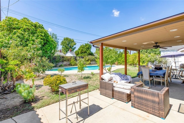 view of patio / terrace featuring a fenced in pool and outdoor lounge area