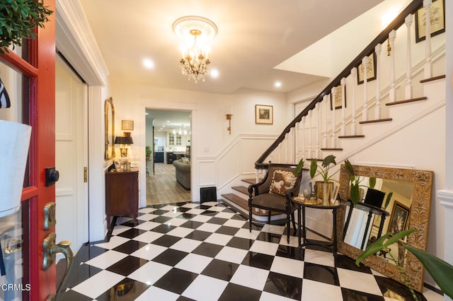 entryway featuring a notable chandelier