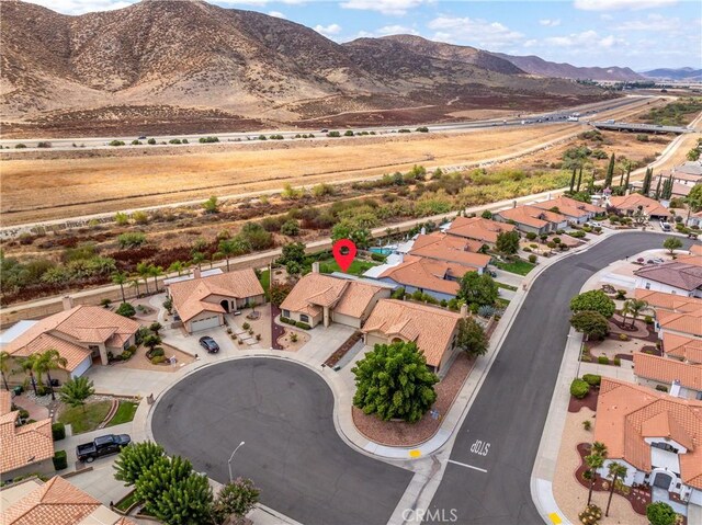 bird's eye view with a mountain view