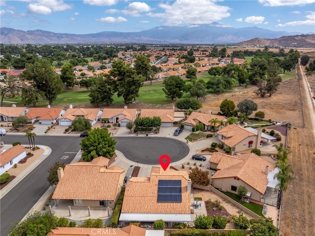 drone / aerial view featuring a mountain view