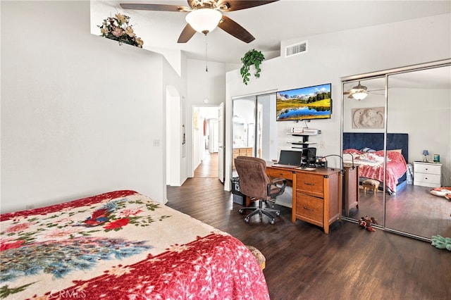 bedroom featuring ceiling fan and dark hardwood / wood-style floors