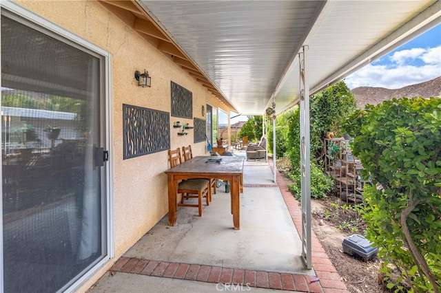 view of patio featuring a mountain view