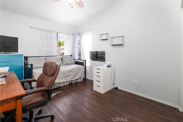 office area featuring vaulted ceiling, ceiling fan, and dark wood-type flooring