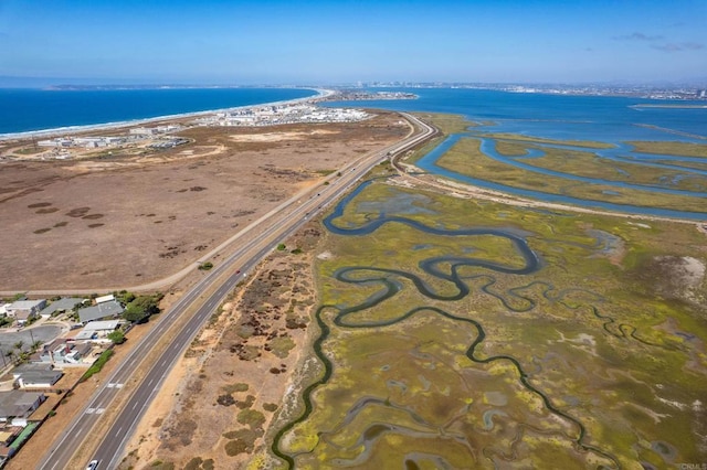 bird's eye view with a beach view and a water view