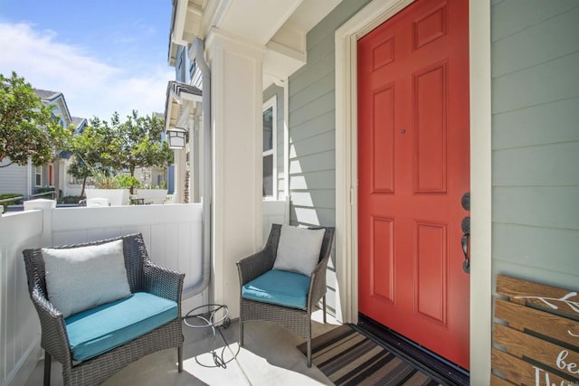 doorway to property with covered porch