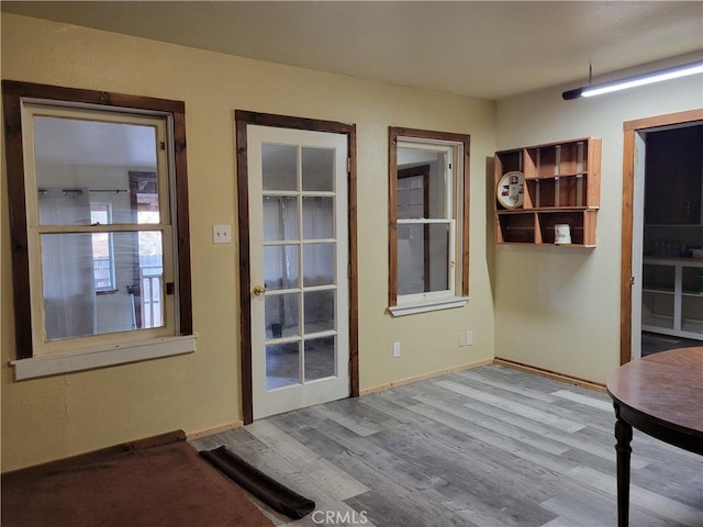 300 Bald Rock Rd, Berry Creek, CA 95916 - doorway to outside with wood finished floors and baseboards