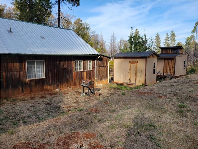 300 Bald Rock Rd, Berry Creek, CA 95916 - back of house with metal roof