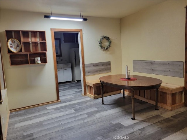 dining area featuring hardwood / wood-style flooring