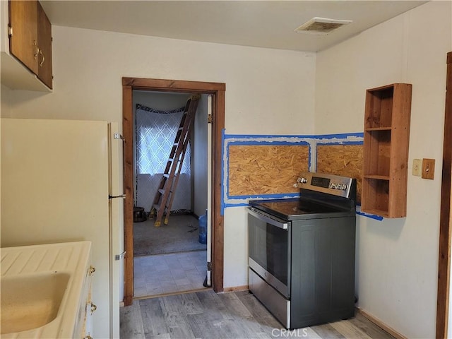 300 Bald Rock Rd, Berry Creek, CA 95916 - laundry room featuring light wood-style floors