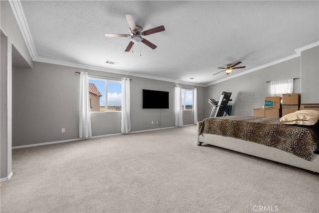 bedroom with a textured ceiling, ceiling fan, and crown molding