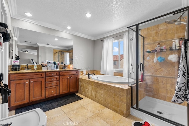 bathroom with vanity, separate shower and tub, ornamental molding, a textured ceiling, and tile patterned flooring