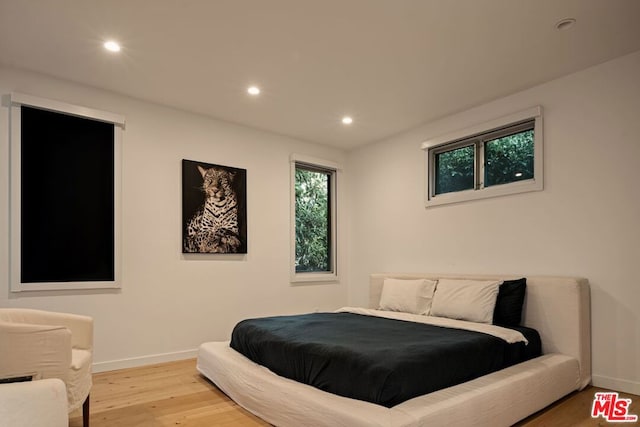 bedroom featuring light hardwood / wood-style flooring