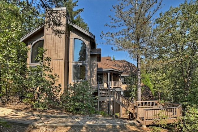 view of front of house featuring a wooden deck