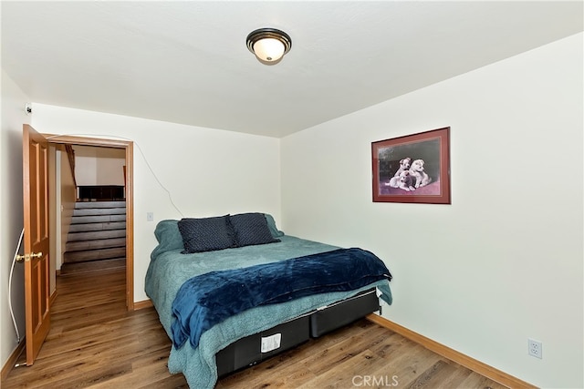 bedroom featuring hardwood / wood-style floors