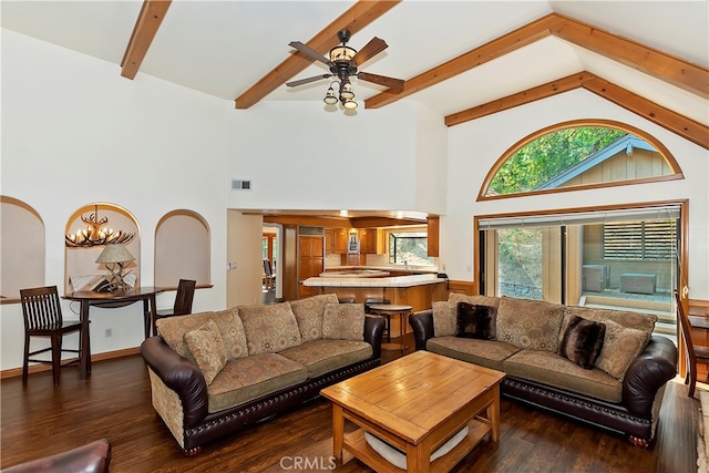 living room featuring ceiling fan with notable chandelier, dark hardwood / wood-style floors, beam ceiling, and high vaulted ceiling