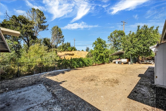 view of yard featuring a carport