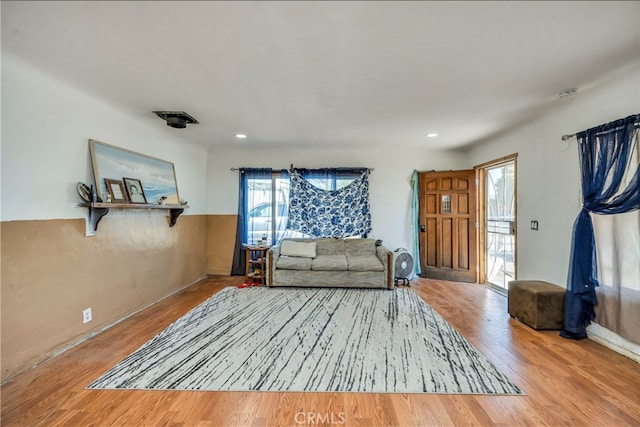 living room with light hardwood / wood-style floors