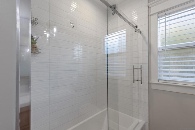 bathroom featuring an enclosed shower