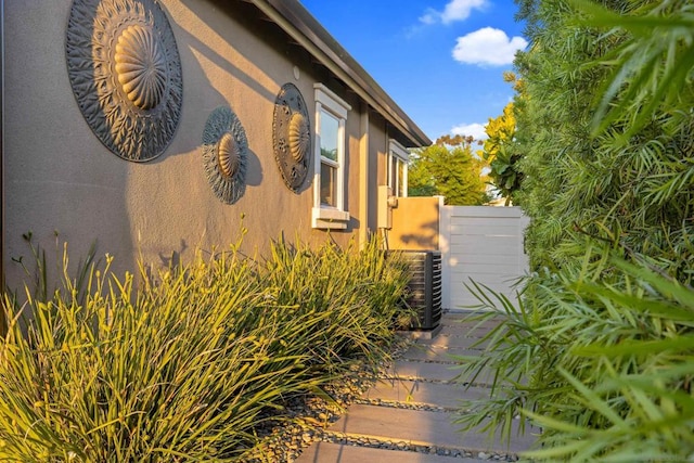 view of property exterior featuring central air condition unit