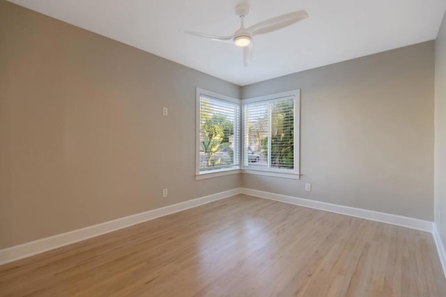 spare room featuring ceiling fan and light hardwood / wood-style floors