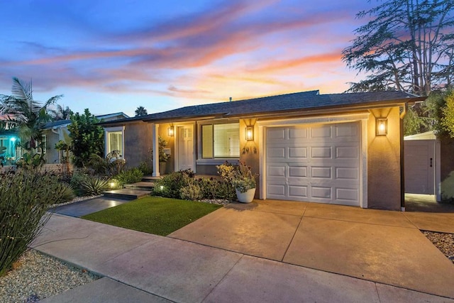 single story home featuring a garage