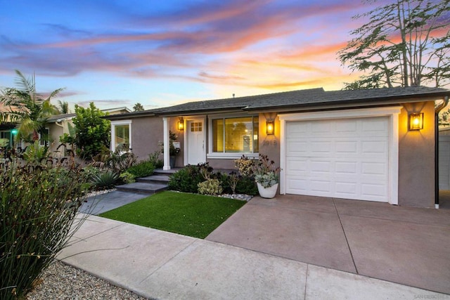 ranch-style house with a garage